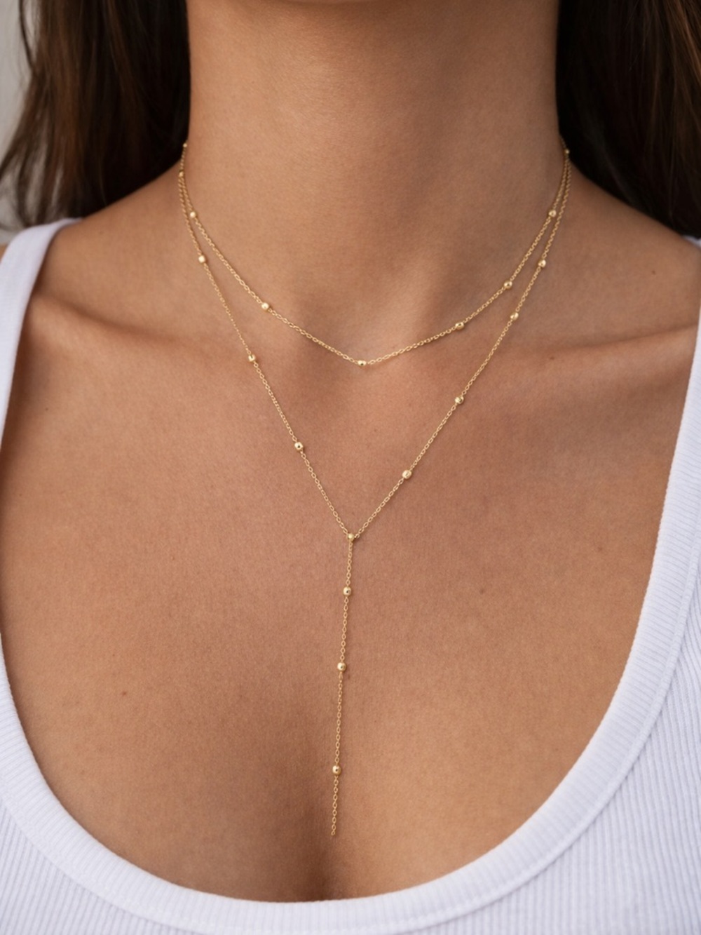 Gold plated double layered chain and ball necklace